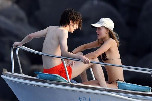 Lily-Rose Depp sexy ass in a little thong bikini making out with Timothee Chalamet on a boat seen by paparazzi.





