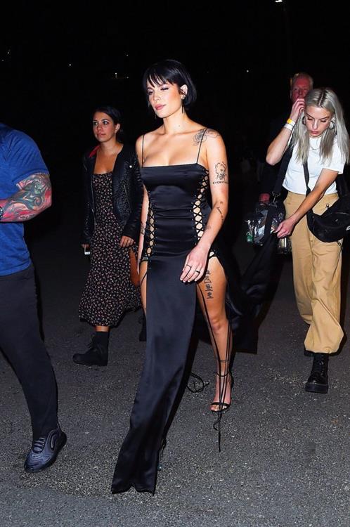 Halsey Pictures Halsey sexy in a very revealing laced dress seen by paparazzi arriving to DKNY fashion show in New York.