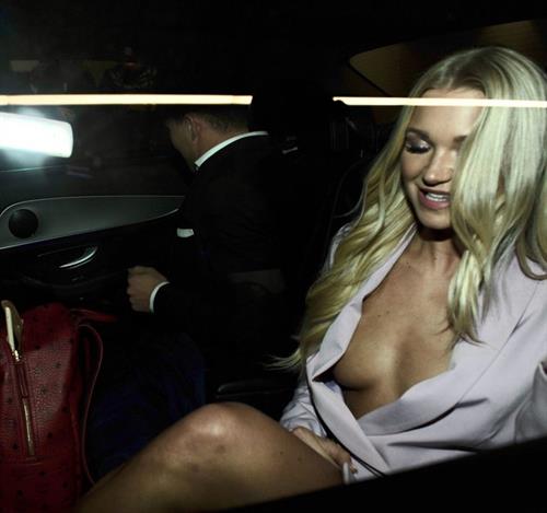 Abbie Quinnen Pictures Abbie Quinnen nip slip wardrobe malfunction seen by paparazzi showing her braless boobs flashing her tits.