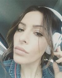 Sarah Shahi taking a selfie