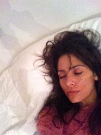 Sarah Shahi taking a selfie