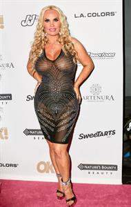 Coco Austin braless boobs in a see through dress showing off her tits seen by paparazzi.
















































