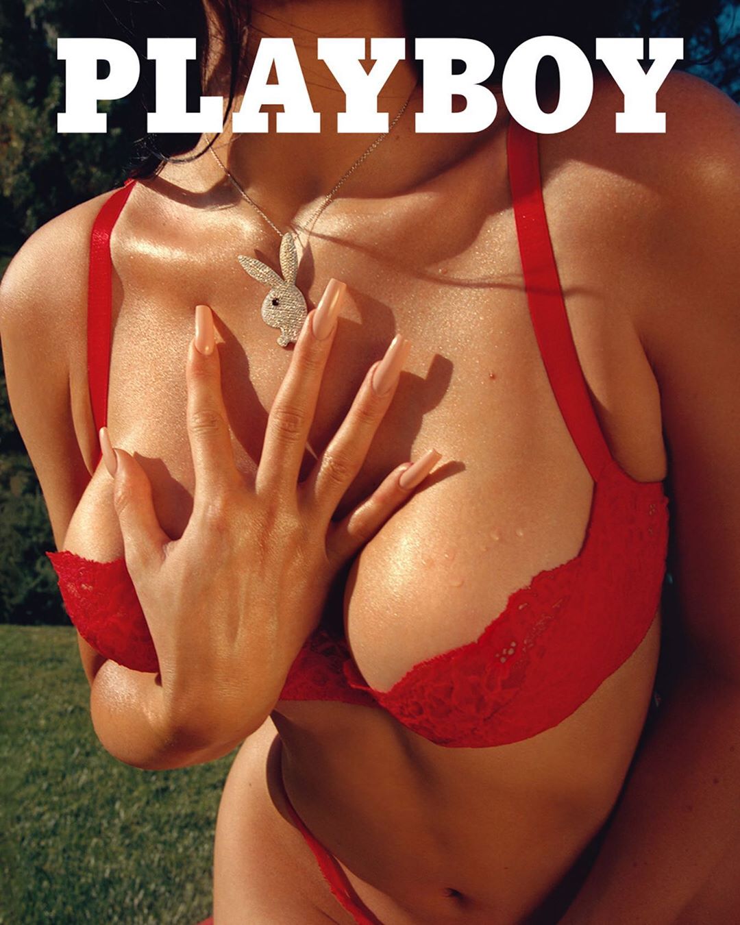 Kylie Jenner new playboy photo in a red lingerie showing her boobs closeup.



