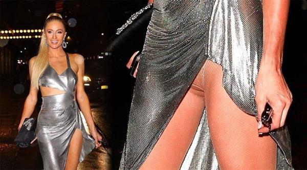 Paris Hilton upskirt nude pussy flash wardrobe malfunction seen by paparazzi in New York.













