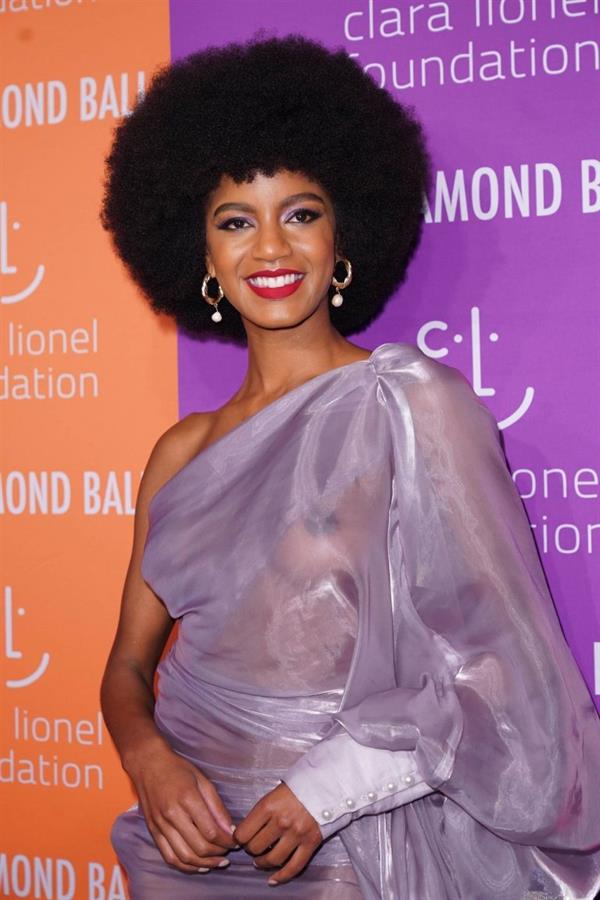 Ebonee Davis braless boobs in a see through dress showing off her tits seen by paparazzi.
















