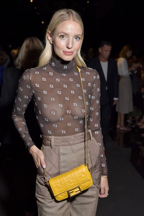 Leonie Hanne braless boobs in a see through top showing off her tits seen by paparazzi at the Fendi show.


































