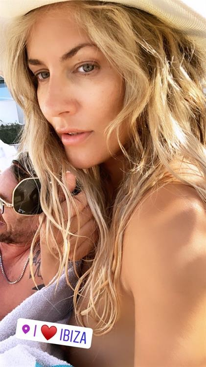 Caroline Flack Pictures Caroline Flack nip slip accidentally flashing her nude boobs under a towel she tried to cover her nipple with text but missed.