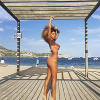 Tina Kunakey in a bikini