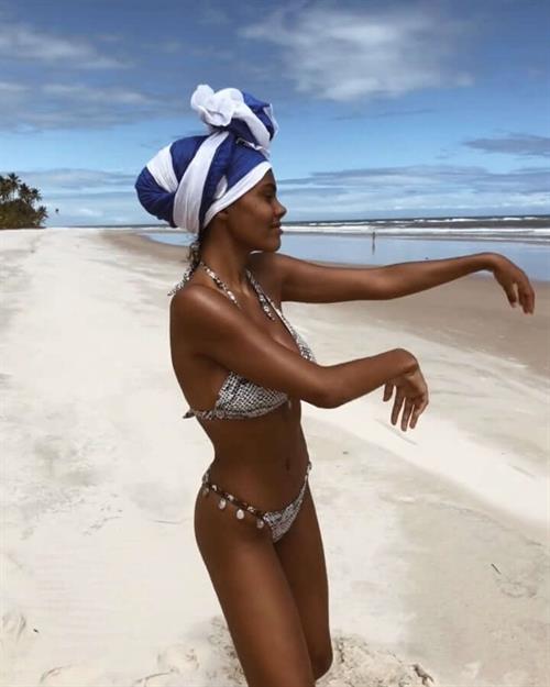 Tina Kunakey in a bikini