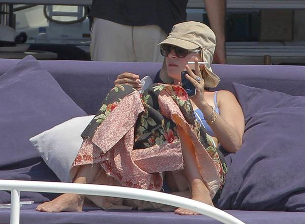 Uma Thurman wearing a bikini top on a yacht in St Tropez July 7, 2013 
