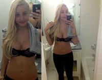 Amanda Bynes in lingerie taking a selfie