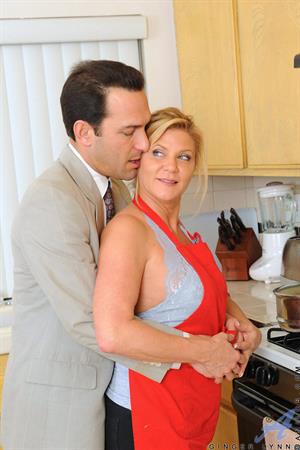 Ginger Lynn Nude Pictures Sex crazed housewife Ginger Lynn gets her wet pussy fucked up by stud in the kitchen
