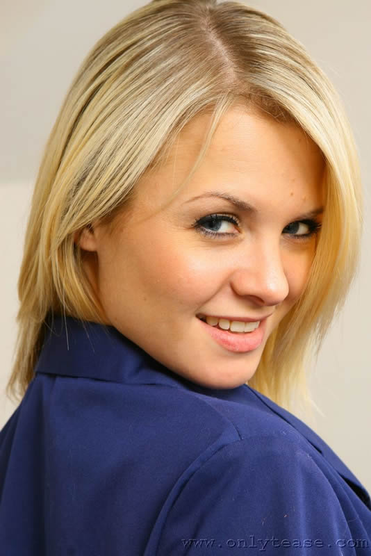  Naughty nurse Rachel shows off her gorgeous pink lingerie. 