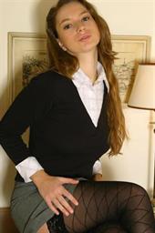  Sexy Alisha in patterned holdups and miniskirt 