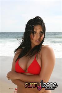 Sunny Leone wearing a red bikini