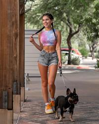 Violet Summers walking her little doggy