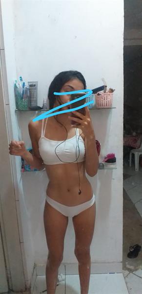 Anonymous in a bikini taking a selfie