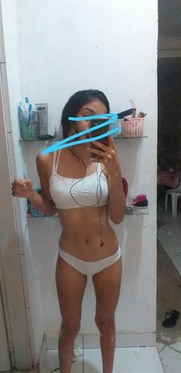 Anonymous in a bikini taking a selfie