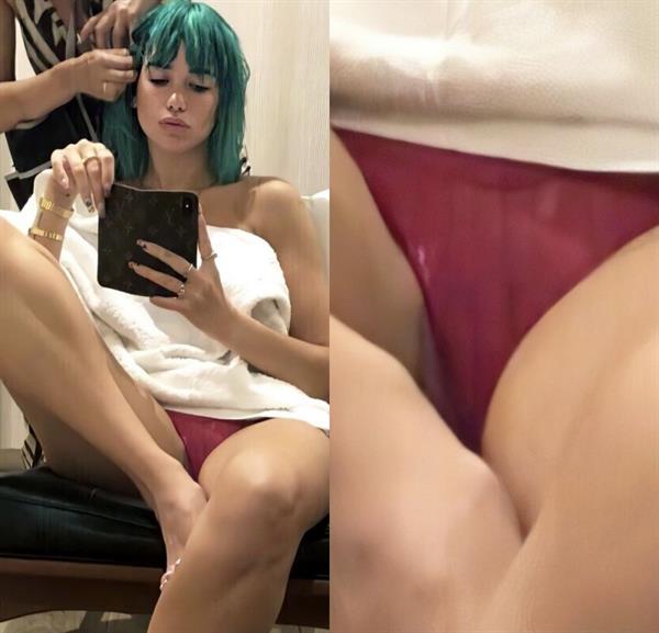 Dua Lipa photo from a while back wearing just see through panties and a towel has been enhanced to show her pussy.