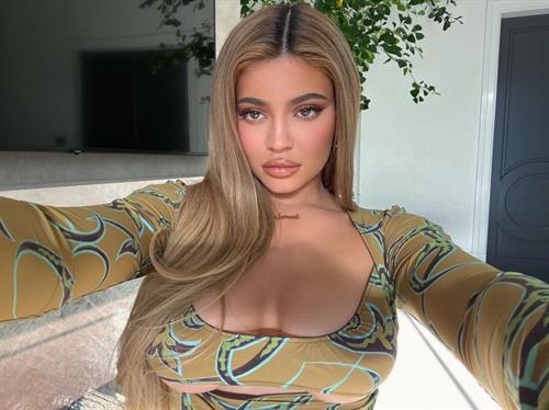 Kylie Jenner Pictures Kylie Jenner braless boobs in a revealing little outfit showing off her big tits cleavage as well as underboob cleavage.