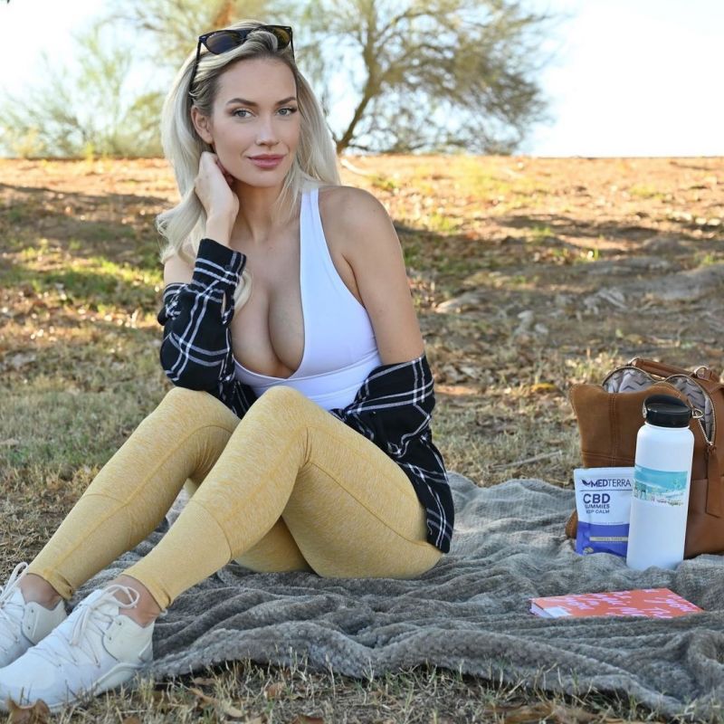 Paige Spiranac Pictures Paige Spiranac braless boobs showing nice cleavage with her big tits in a sexy little white tank top.
