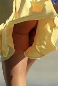 Kate Middleton boobs showing nice cleavage with her big tits, hot ass, legs, and panties from several upskirt wardrobe malfunctions caught by paparazzi for her sexy photo collection.