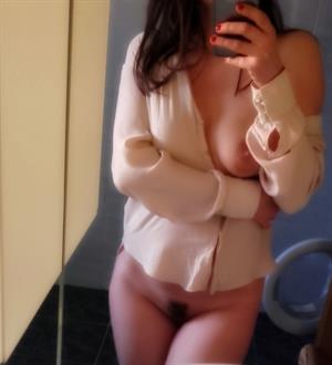 Lepricorn/Louise Hay taking a selfie and - breasts