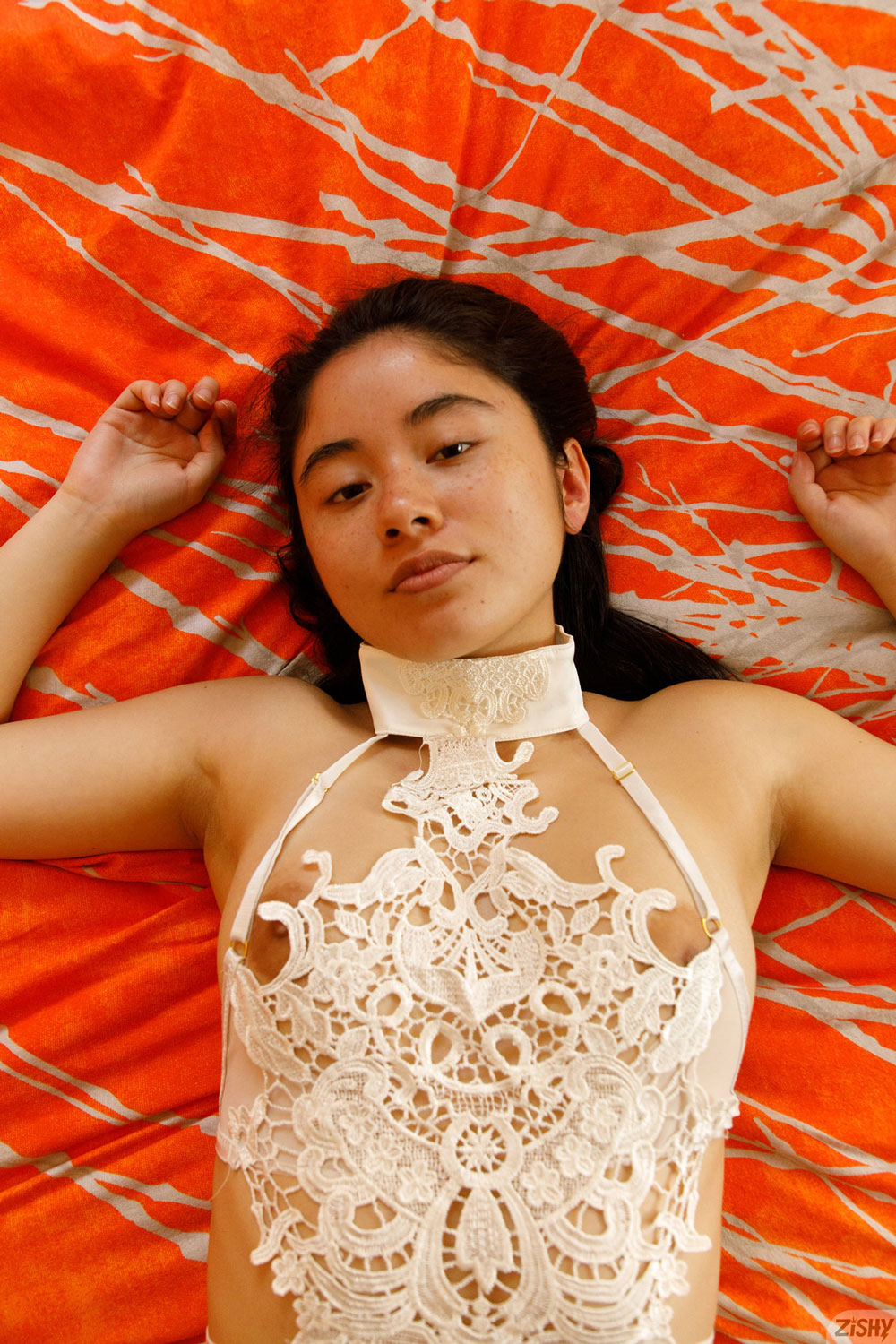 Lolita Minh Strips in her Room