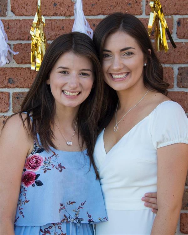 Caitlin Gooch (left) and her big sister Jess (right)