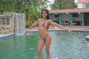 Penellope Nude Pictures Penellope: Relaxing By The Pool