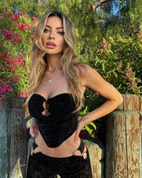 Ashley Schultz is an American model, singer, and social media influencer. She was formerly a member of all-girl trio Syd Youth.