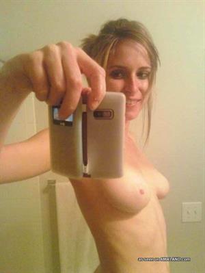 Anonymous taking a selfie and - breasts
