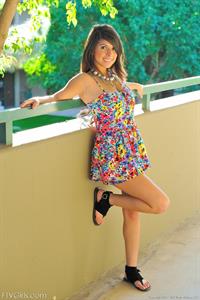 Leila does cartwheels topless outside