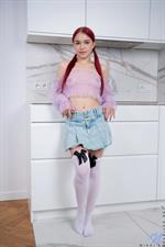 A sheer shirt does nothing to hide the jut of Wikki K's tits and the sweet little nipples hiding underneath.