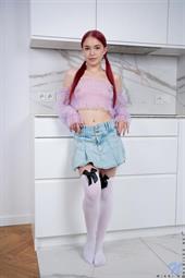 A sheer shirt does nothing to hide the jut of Wikki K's tits and the sweet little nipples hiding underneath.