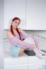 A sheer shirt does nothing to hide the jut of Wikki K's tits and the sweet little nipples hiding underneath.