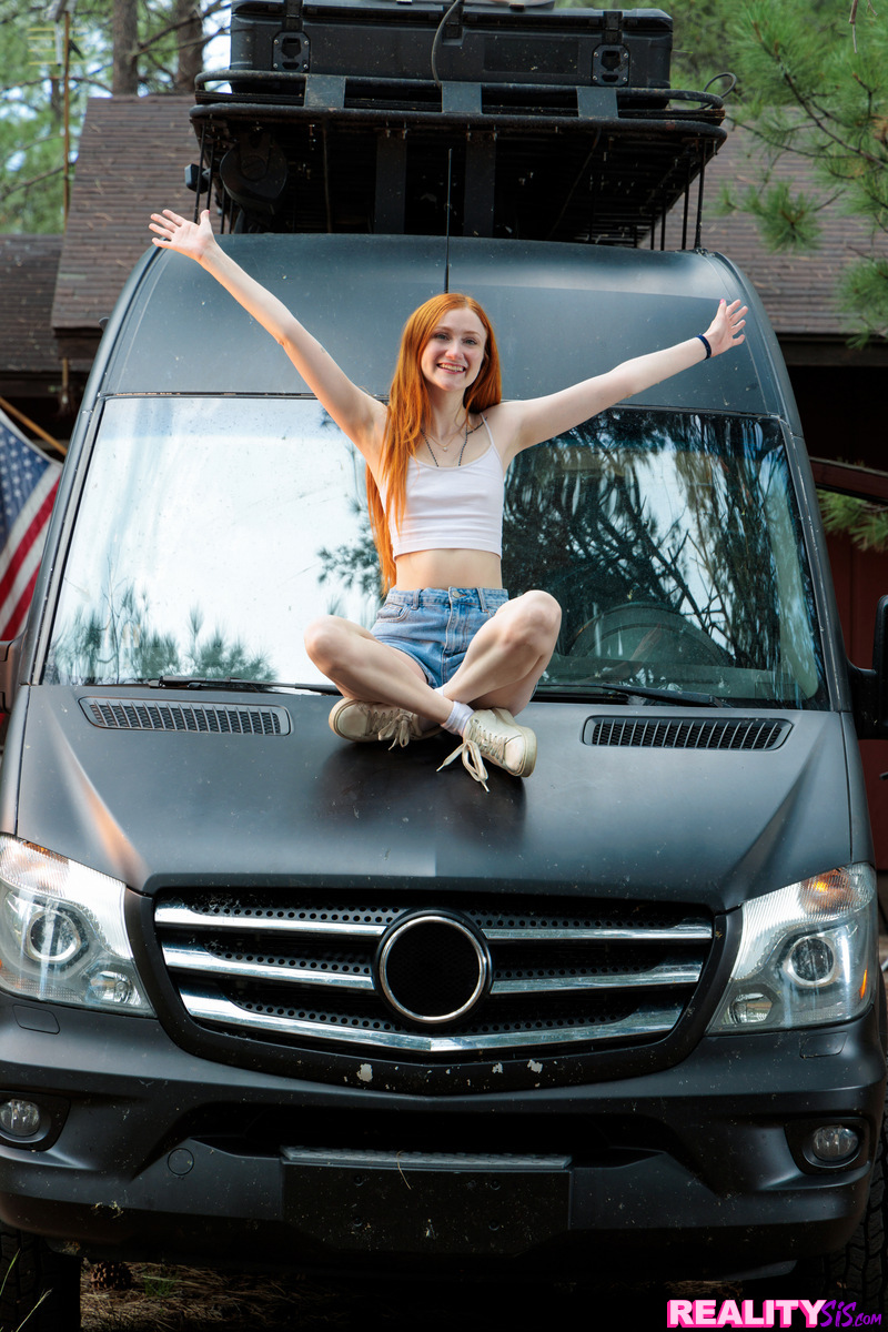 Exhibitionist redhead Scarlet Skies shows us her new van and then how she fucks her stepbrother on the bed inside