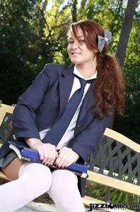Firery redheaded school girl strips outdoors