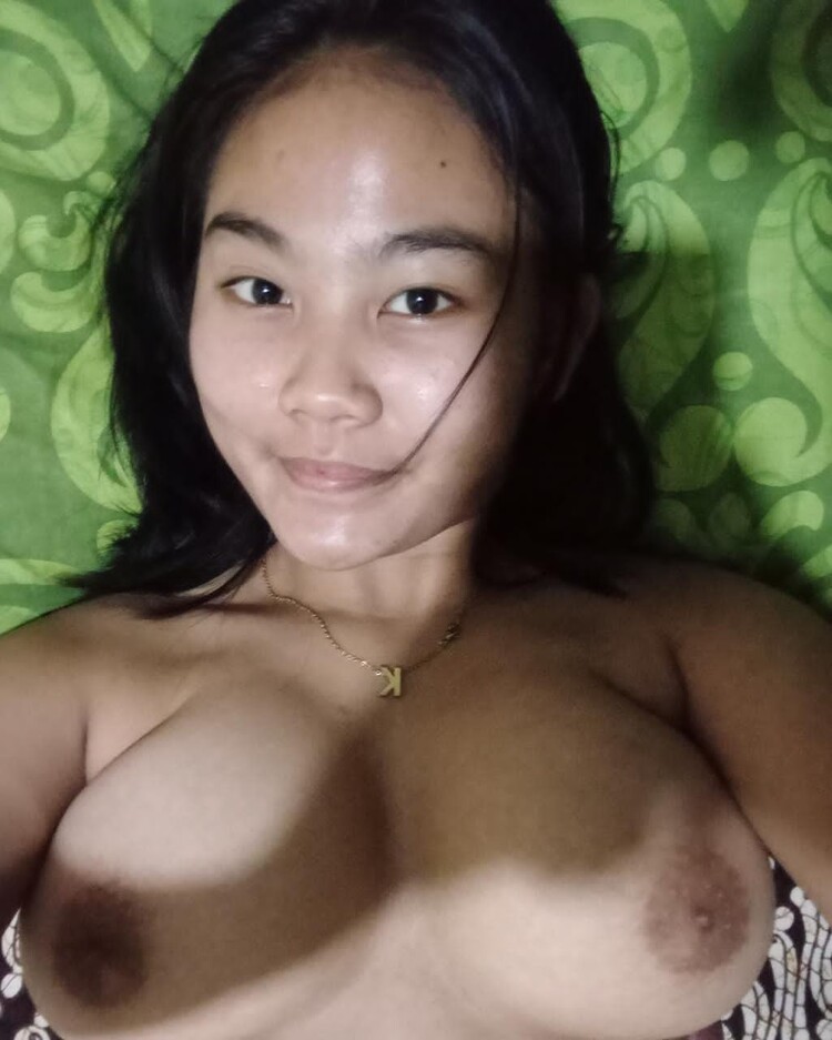 Karisma taking a selfie and - breasts