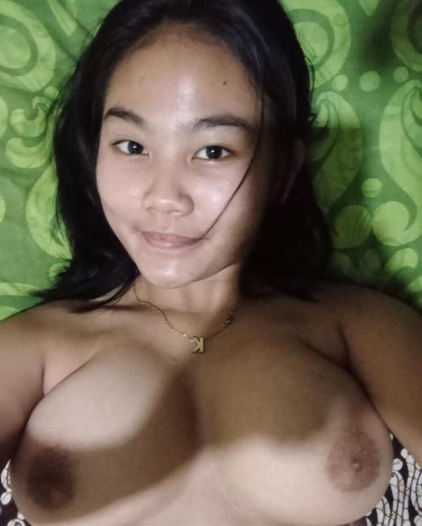 Karisma taking a selfie and - breasts