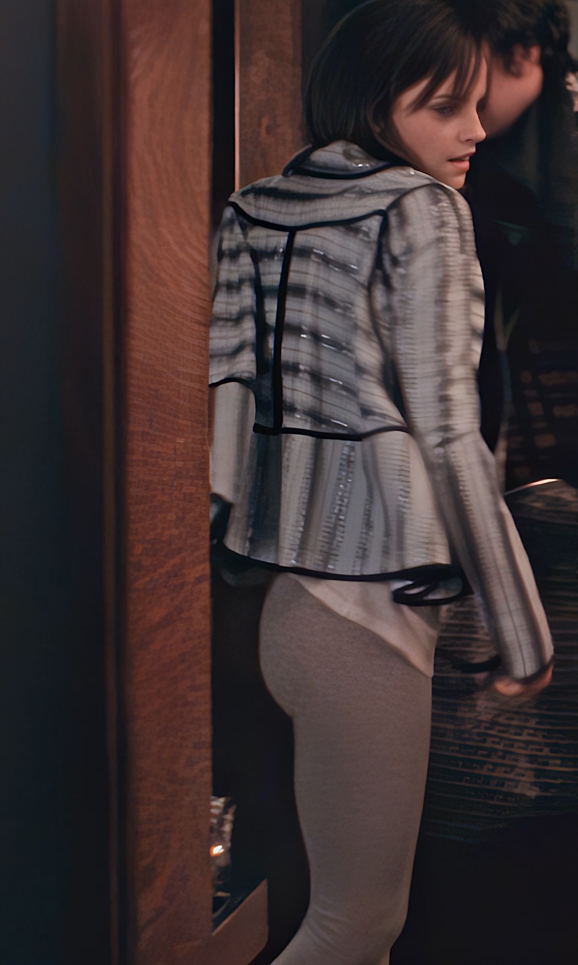 A teasing flash of Emma Watson’s asscheeks outlined in tight leggings from  The Bling Ring 