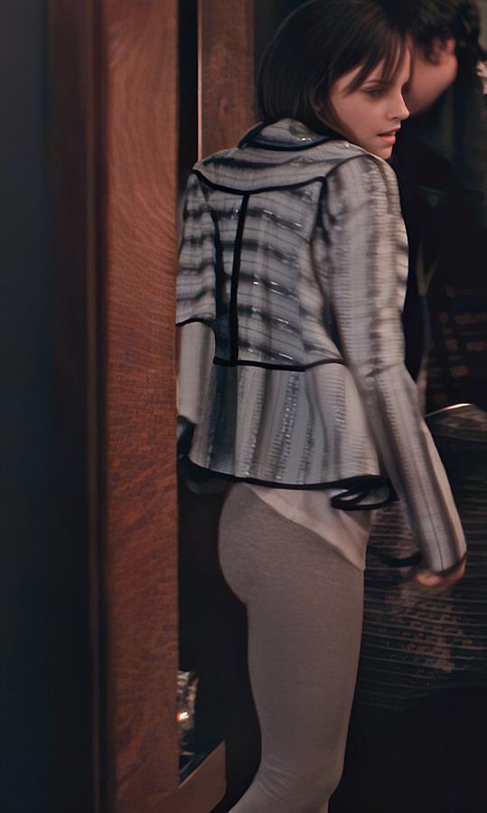 A teasing flash of Emma Watson’s asscheeks outlined in tight leggings from  The Bling Ring 