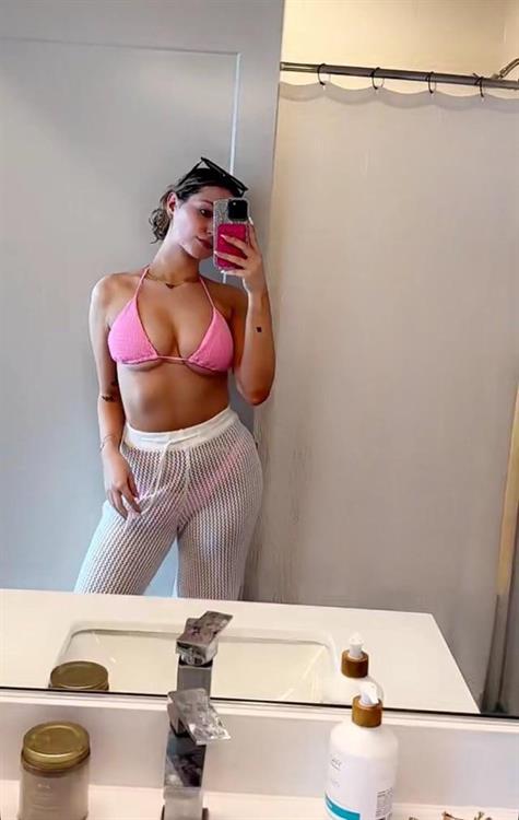 Hannah Montoya in a bikini taking a selfie