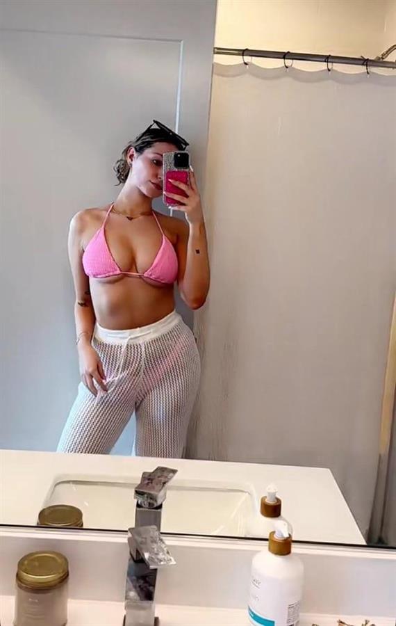 Hannah Montoya in a bikini taking a selfie