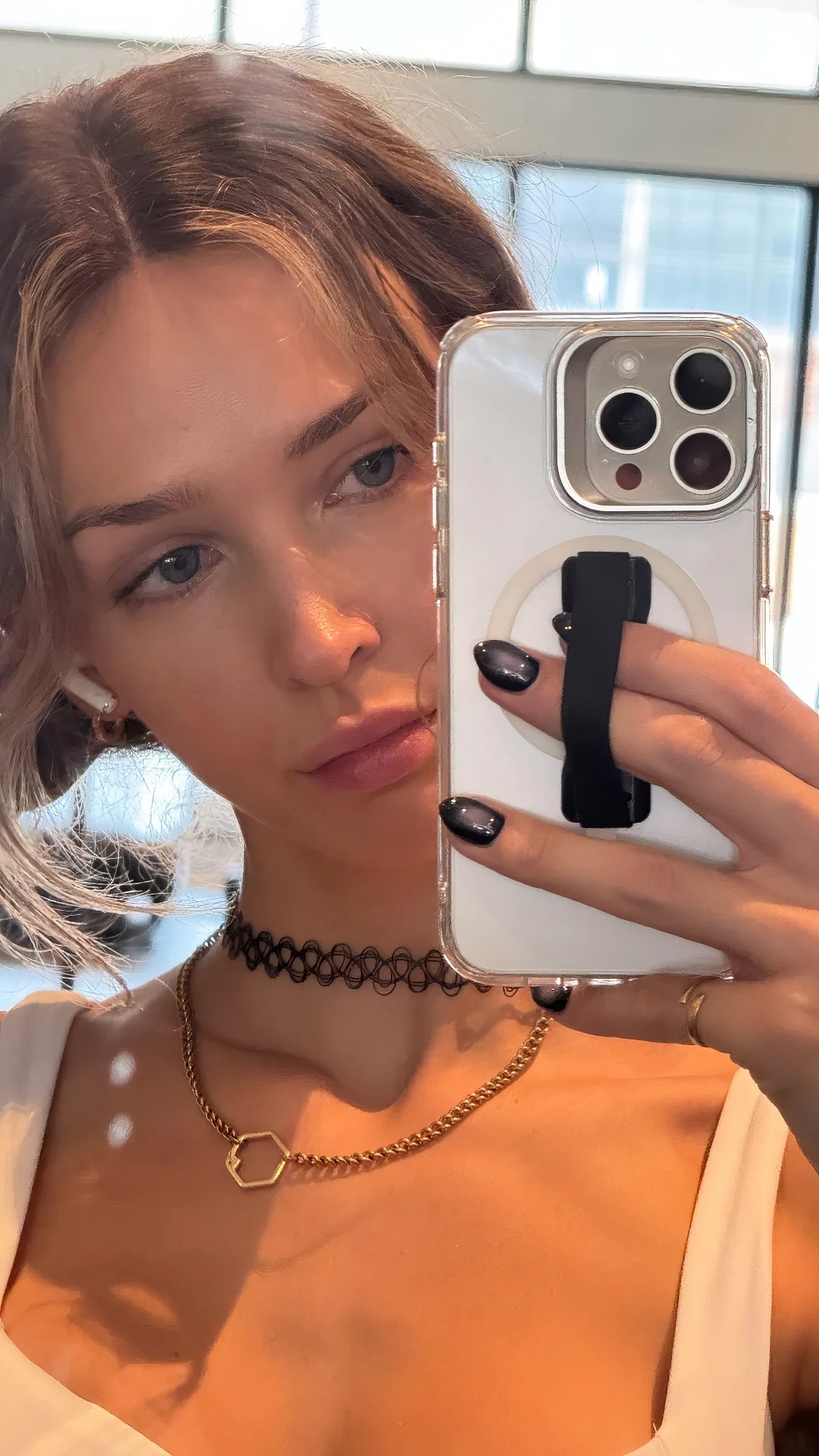 Rachel taking selfies of Rachel