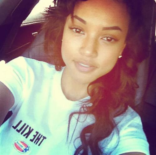 Karrueche Tran taking a selfie