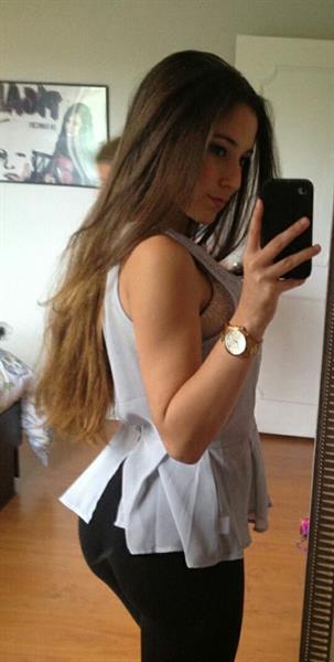 Angie Varona taking a selfie and - ass