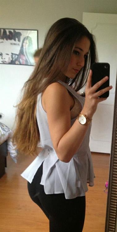 Angie Varona taking a selfie and - ass