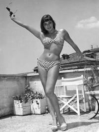 Joan Collins in a bikini