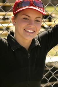 Sara Sexton has a little fun in the park and a red baseball cap